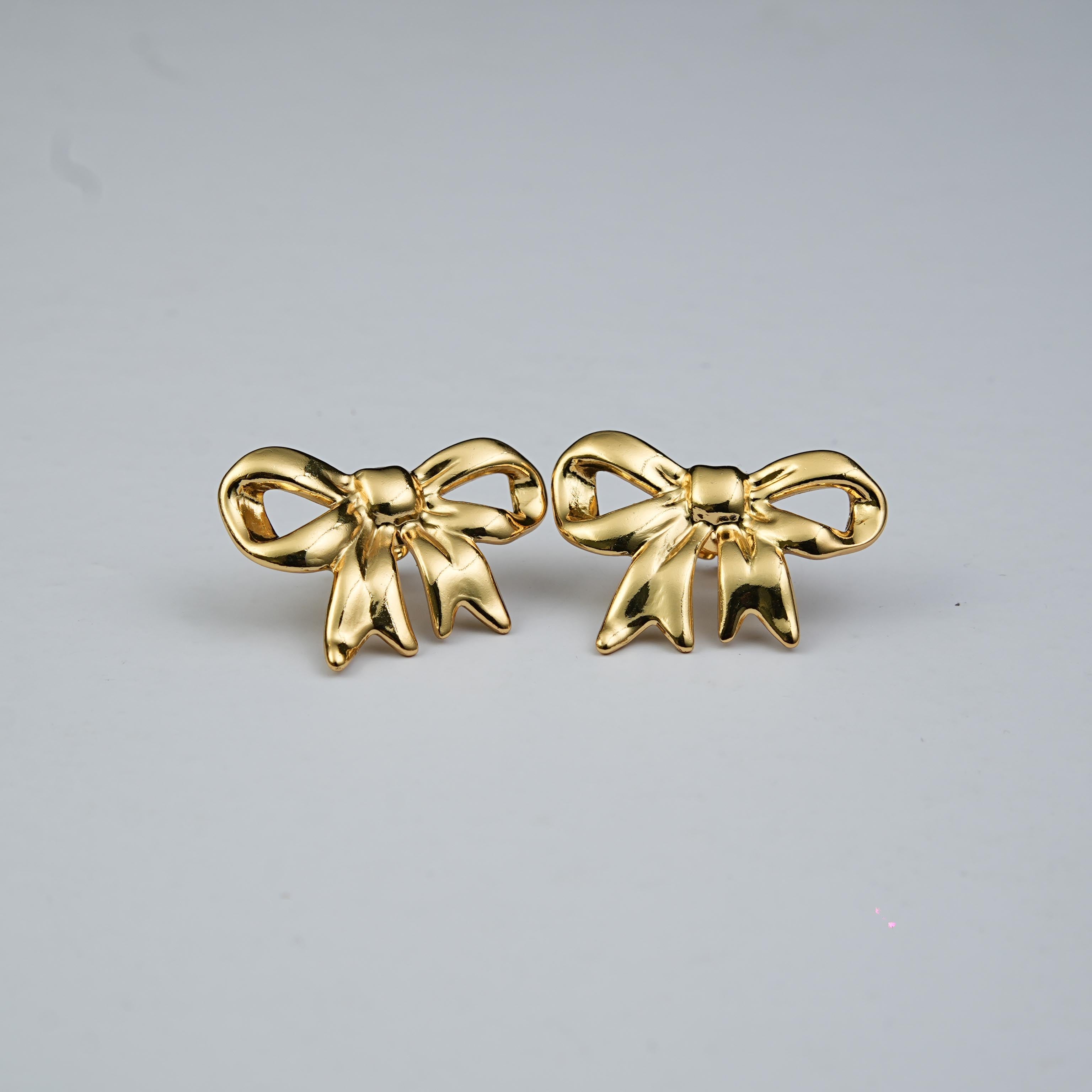 Lustre Tied in Time earrings
