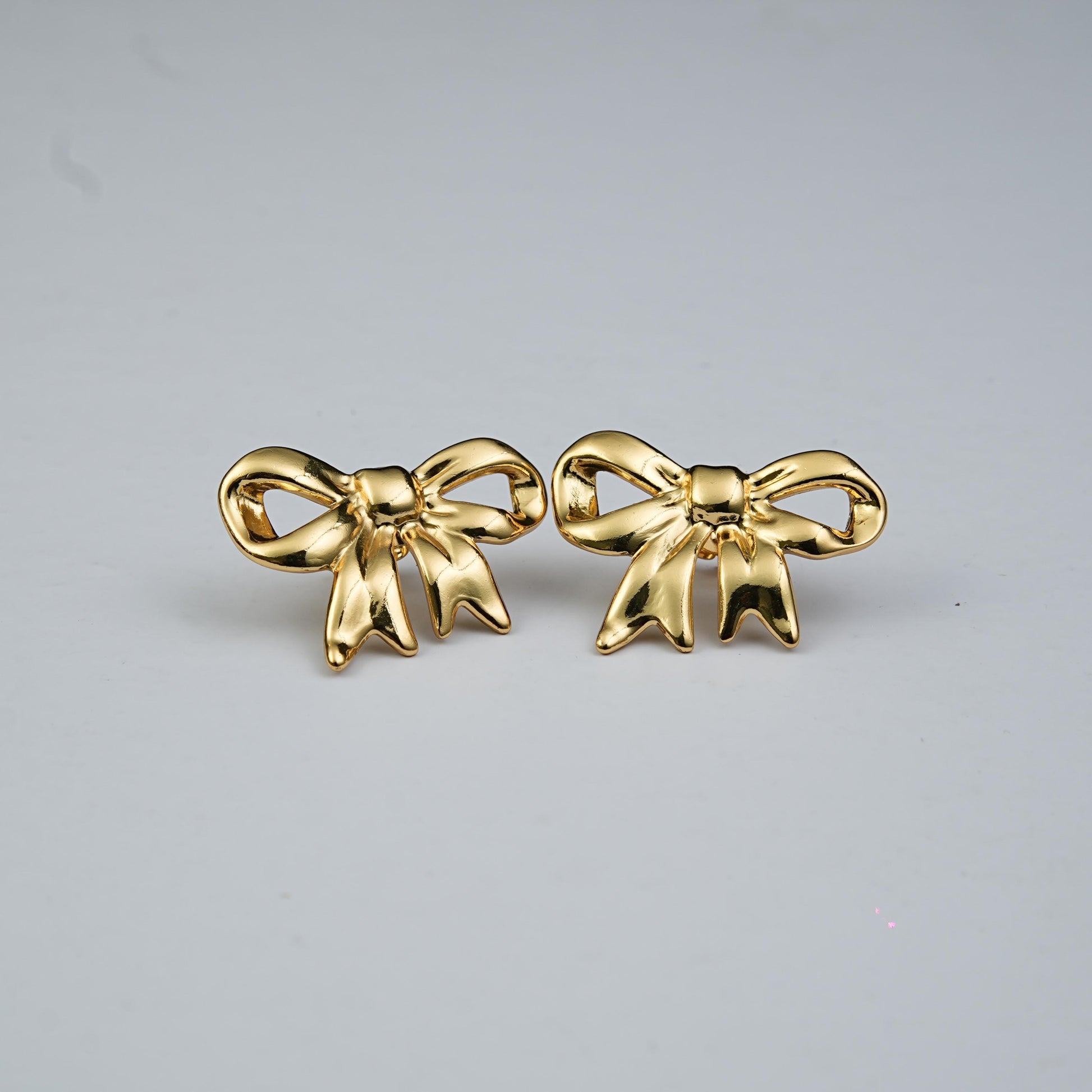 Lustre Tied in Time earrings