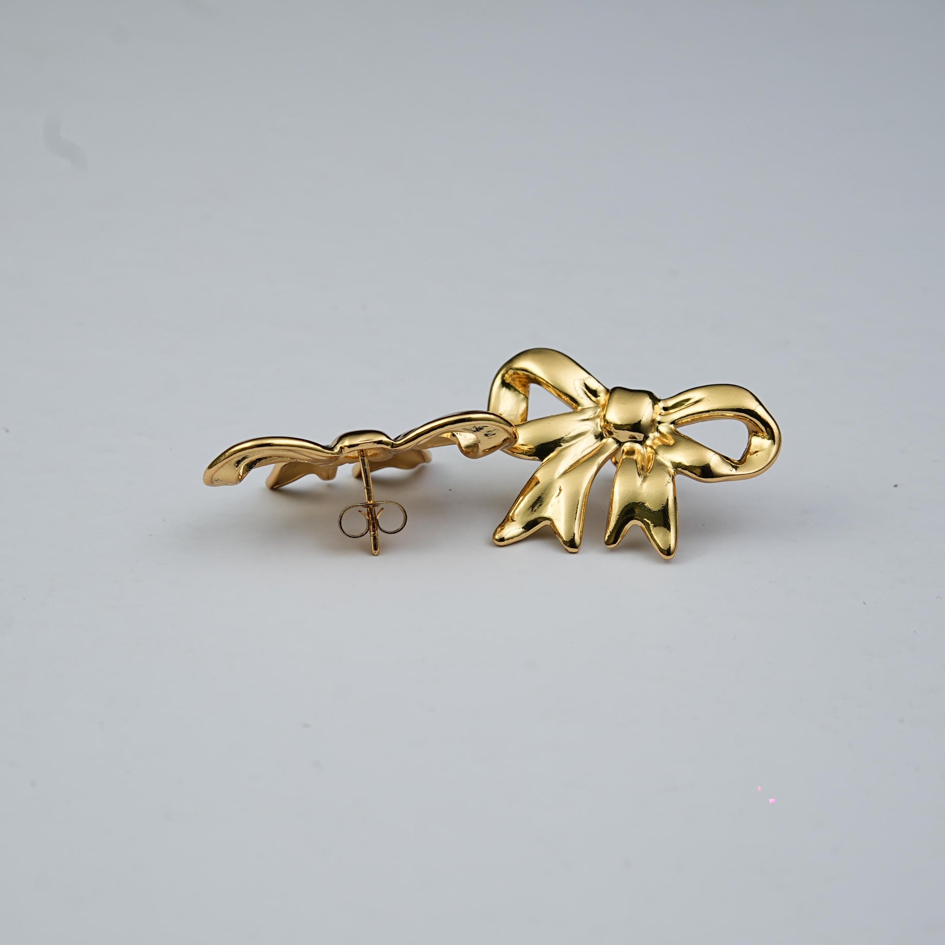Lustre Tied in Time earrings