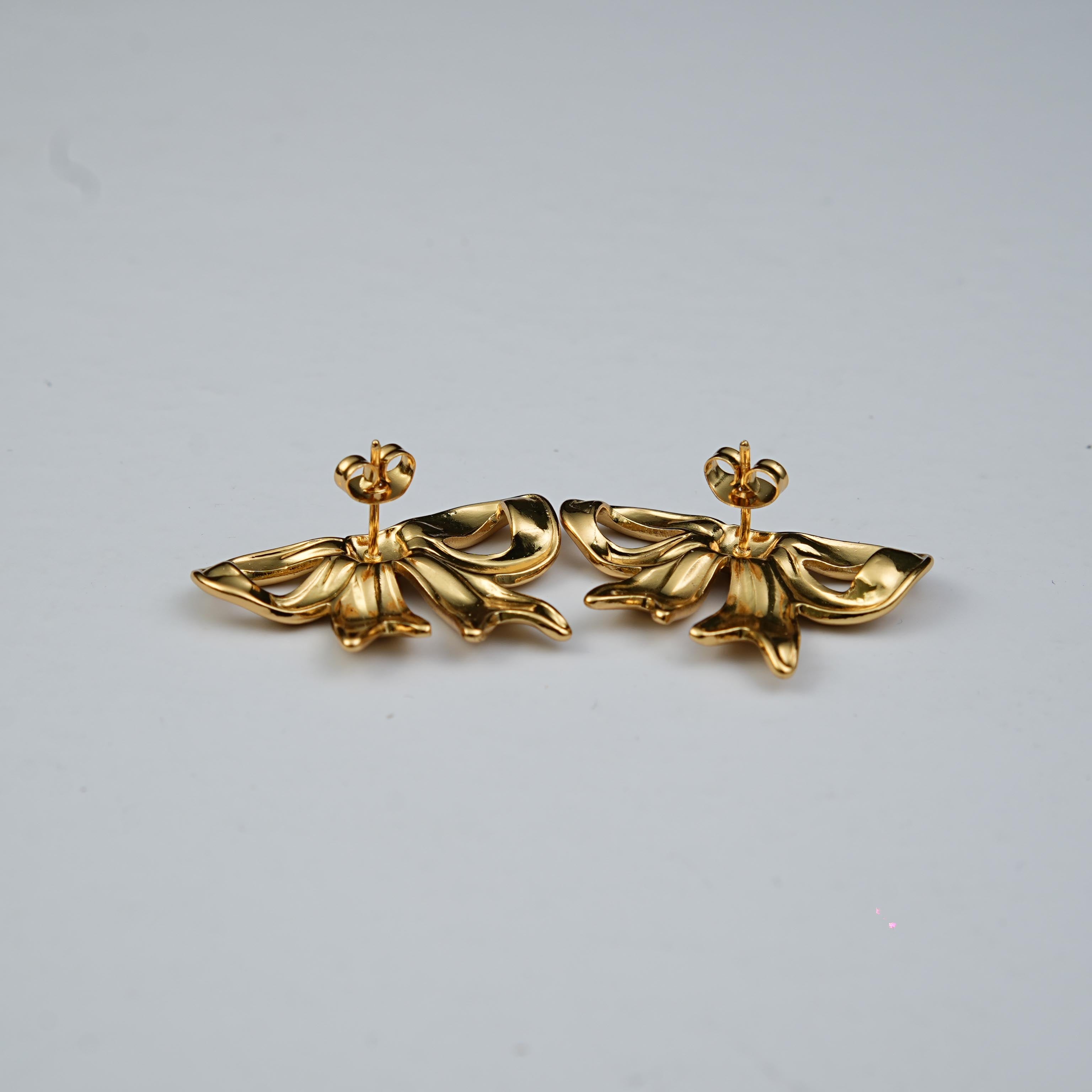 Lustre Tied in Time earrings