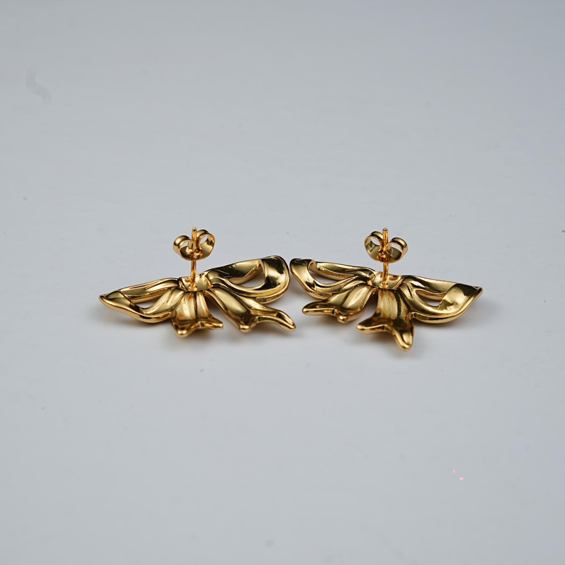 Lustre Tied in Time earrings